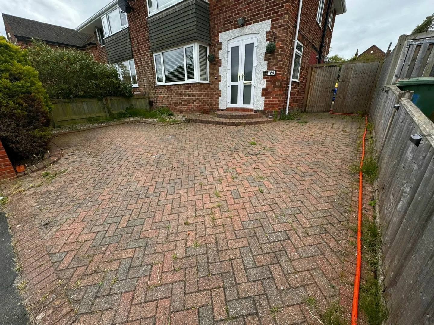 Driveway before professional cleaning by Total Gleam