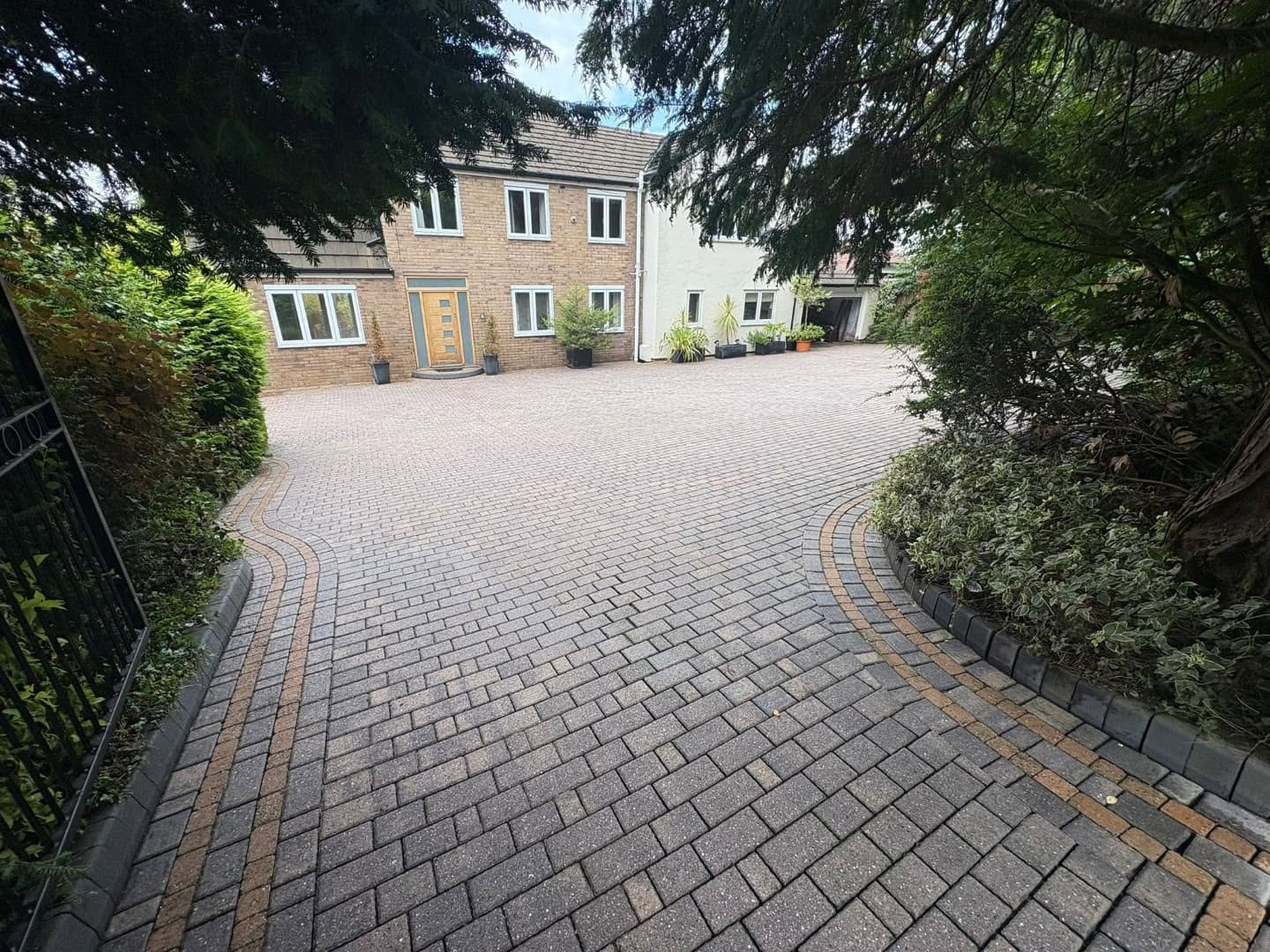 Driveway after professional cleaning by Total Gleam