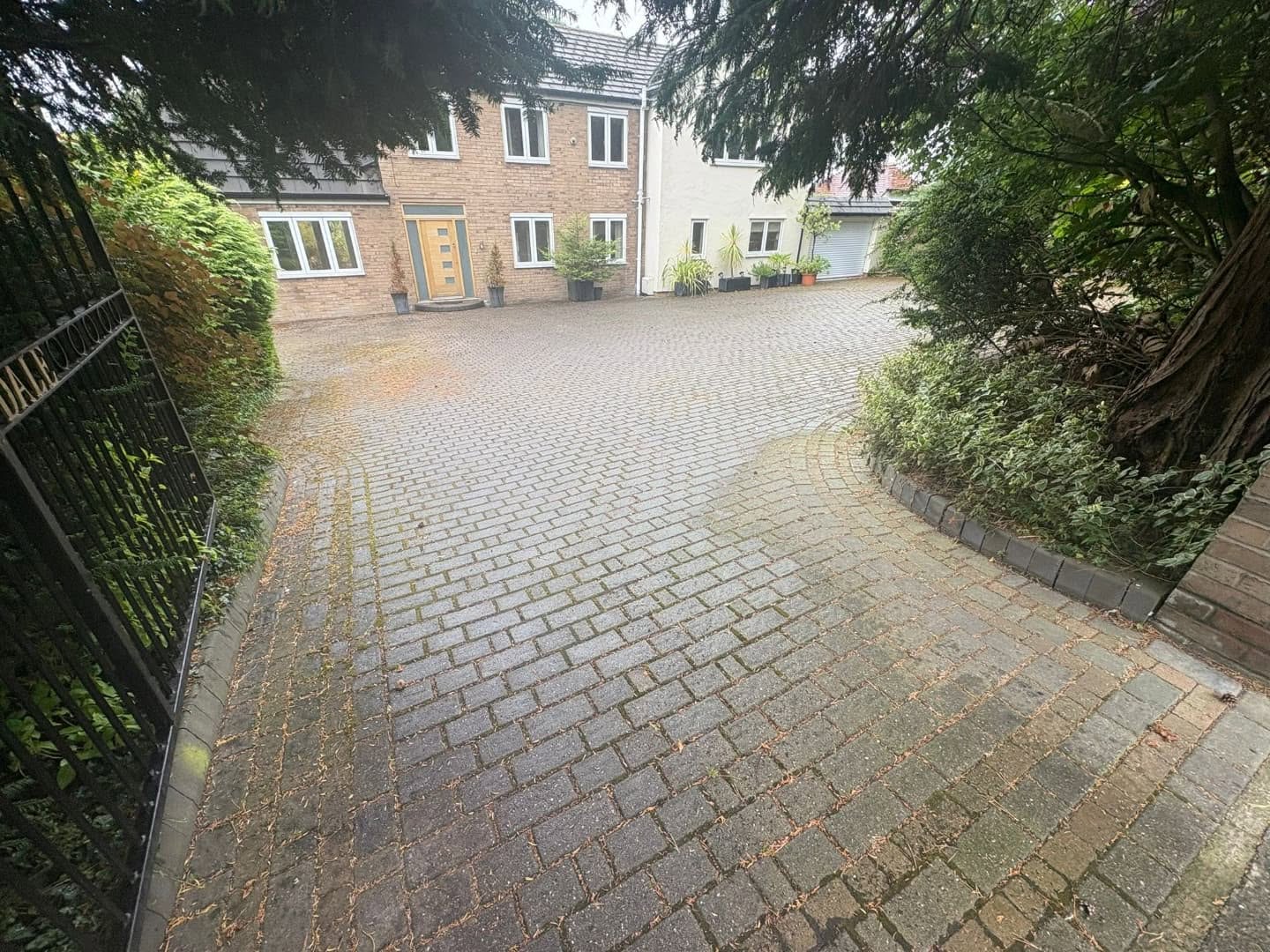 Driveway before professional cleaning by Total Gleam