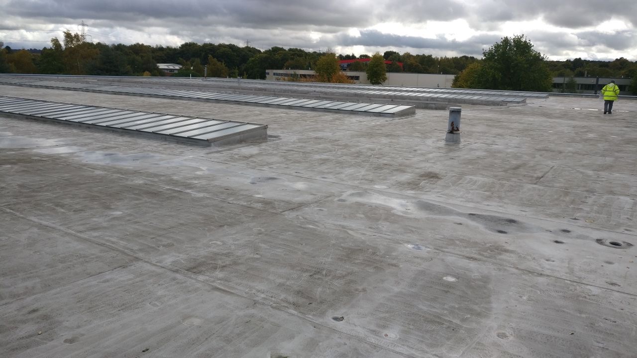 Industrial flat roof before cleaning by Total Gleam