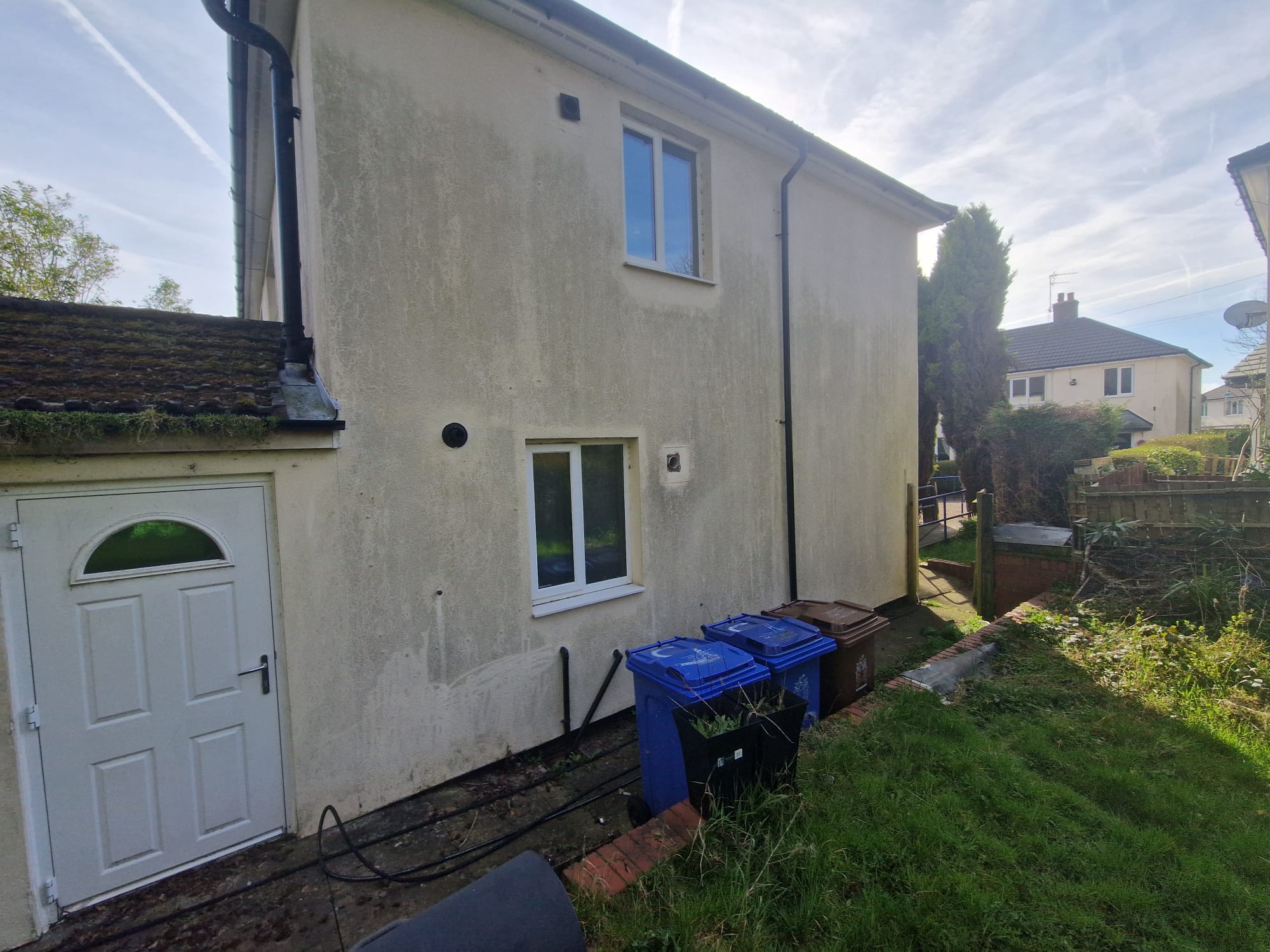 Rendered house before professional render cleaning by Total Gleam