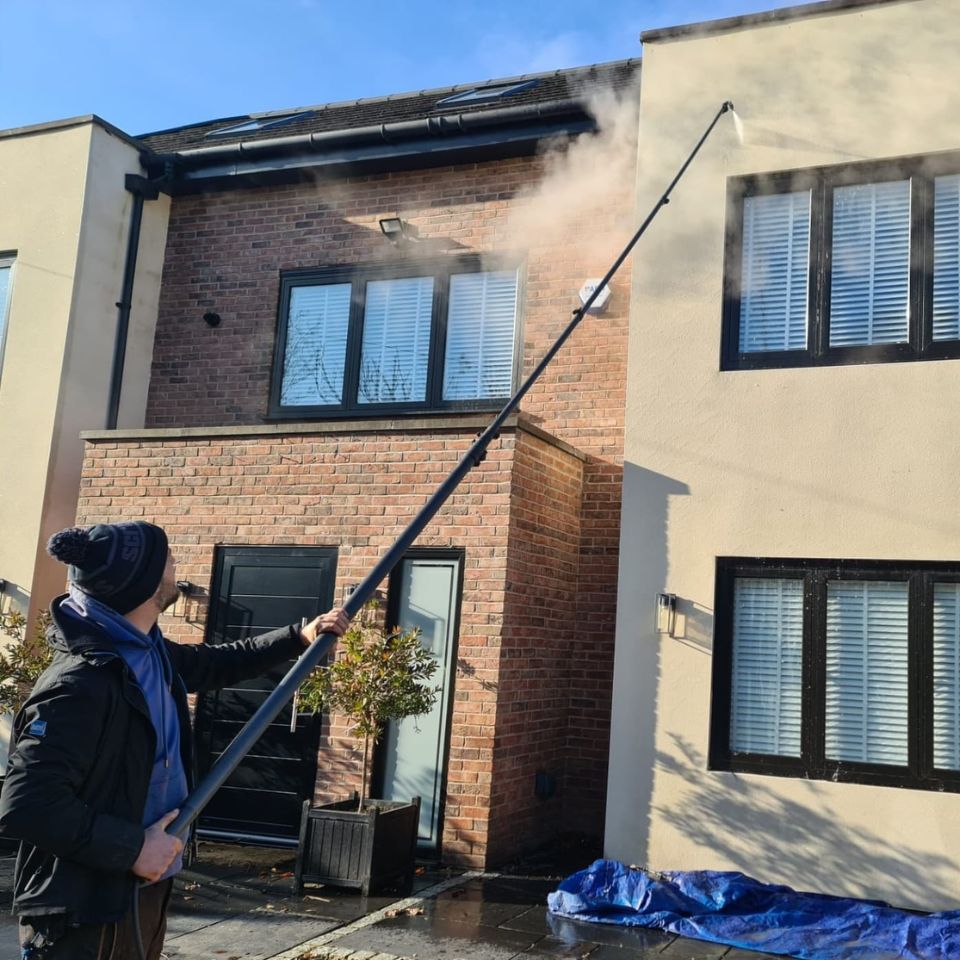 Total Gleam steam cleaning a rendered exterior